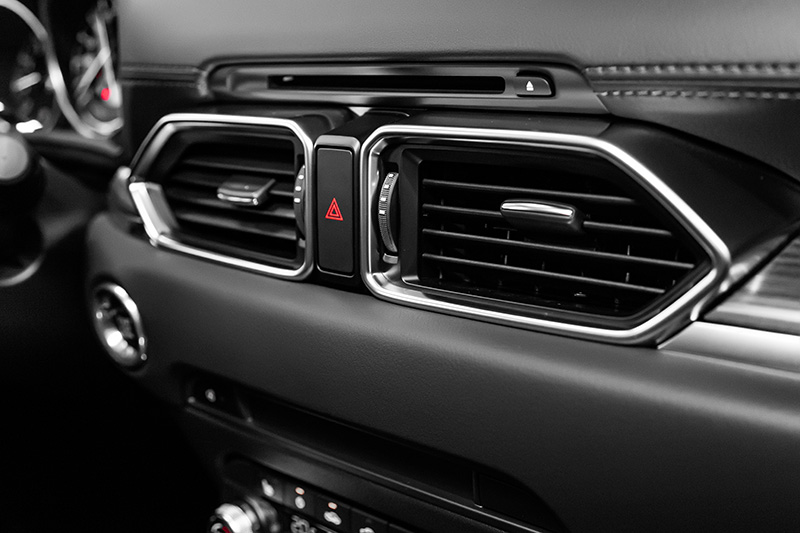 Vehicle air conditioning vents and climate control system inside car